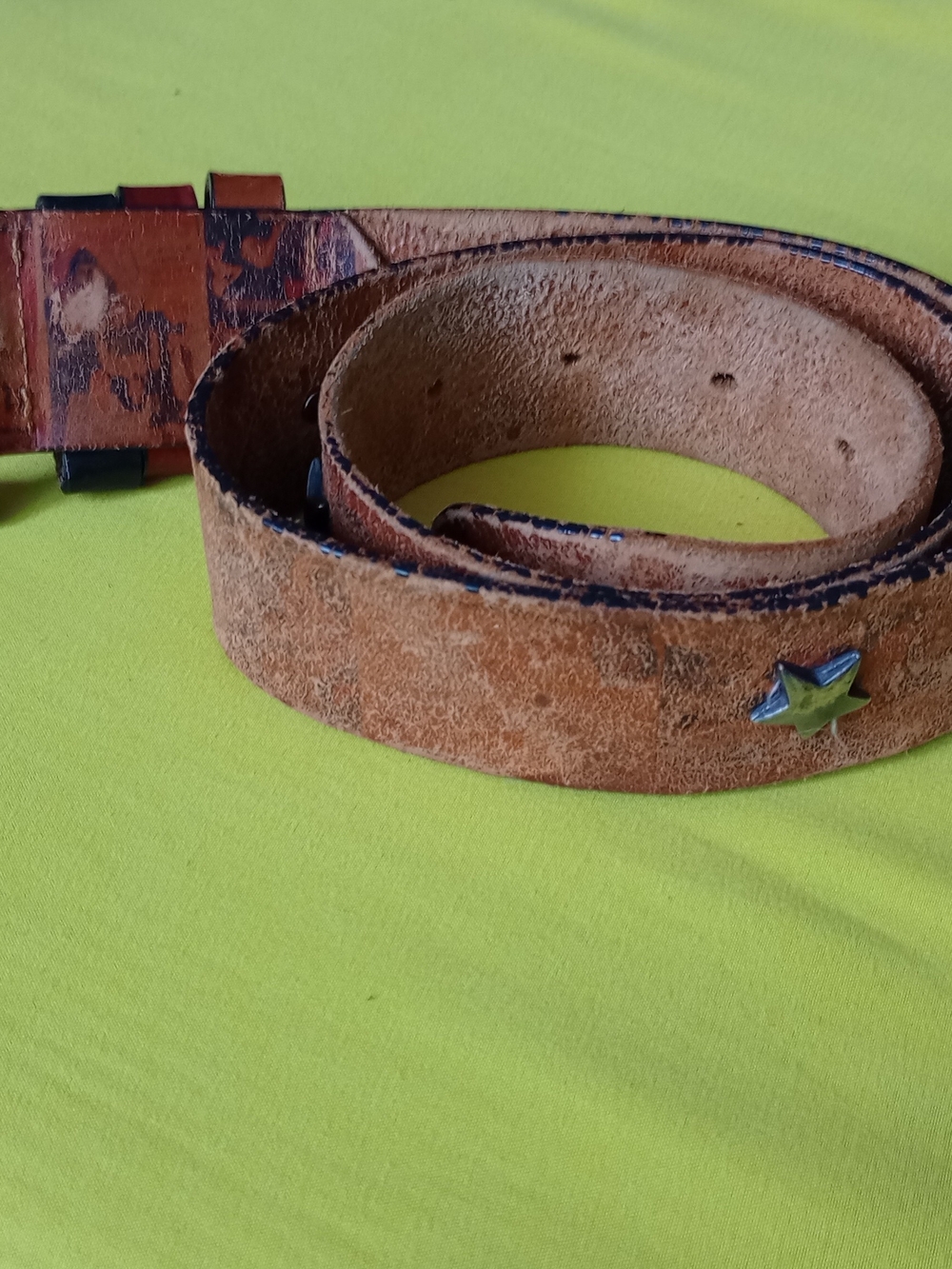 Jenny and the Boys" branded genuine leather belt in a natural brown finish.